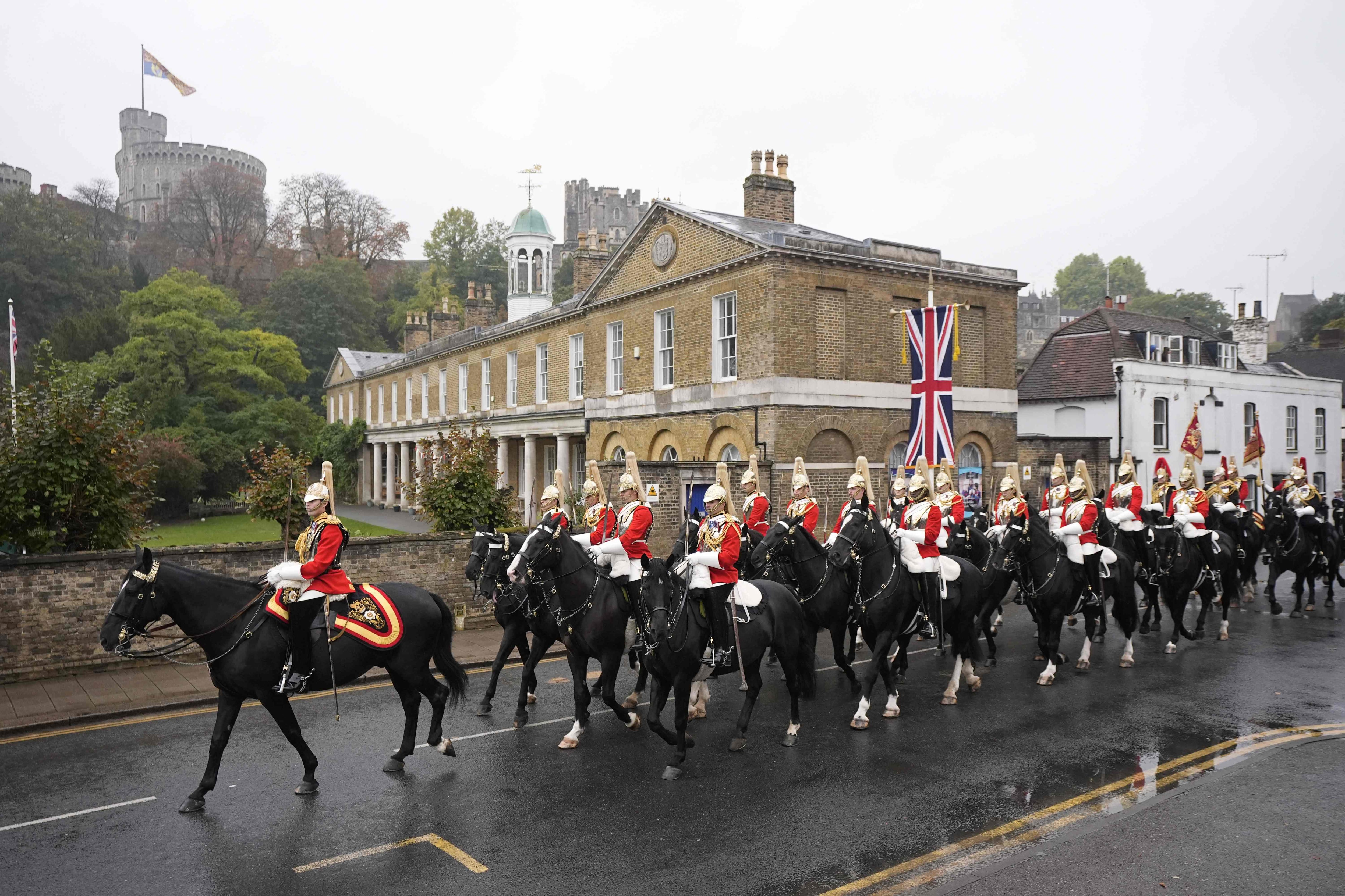 The Household Cavalry's Life Guards ride through Windsor. AFP