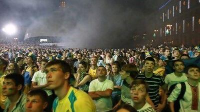 Fans of Ukraine react at a fan zone in Kiev.