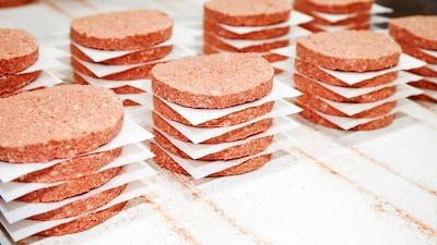 Freshly made meat-imitation burgers at the Impossible Foods factory. Courtesy of Impossible Foods