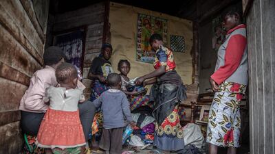 Valentine Kazingufu resettles with her family in her brother's home in the Majengo neighbourhood of Goma.