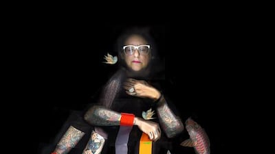 Juliana (with tattoos) is one of the works on display as part of Maitha Demithan's exhibition Mutajadid. Courtesy Maitha Demithan / Tashkeel