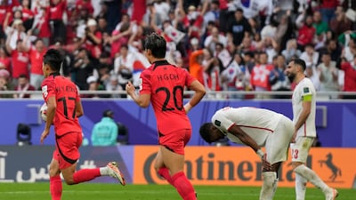 South Korea's Jeong Woo-yeong, left, carries the ball after Jordan's Yazan Al Arab scored an own goal in their Asian Cup match at the Al Thumama Stadium in Qatar on Saturday, January 20, 2024. AP