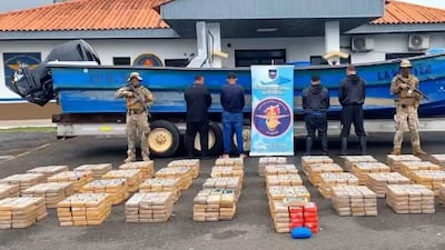 International Security Alliance personnel with seized drugs. The agency has exchanged expertise on smuggling methods to crack down on the illicit trade. Wam