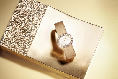 The Traditional watch and clutch inspired by Piaget’s Palace Decoration texture. Courtesy Piaget