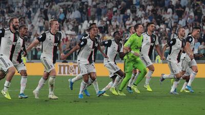 Juventus players celebrate after defeating Napoli. Getty Images