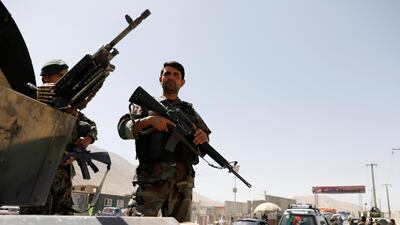 Afghan National Army soldiers keep watch at a checkpoint on the Ghazni-Kabul highway. Reuters