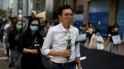 People attend a rally in Hong Kong to mark the death of university student Chow Tsz-lok on November 8, 2019. Reuters