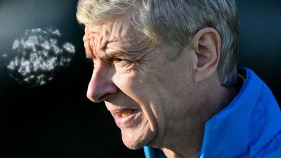 Arsene Wenger, Arsenal’s French manager, supervises a team training session at the London Colney training ground, north of London. Ben Stansall / AFP