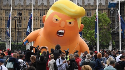 Anti Trump protesters displayed a Trump baby blimp over Parliament Square. EPA