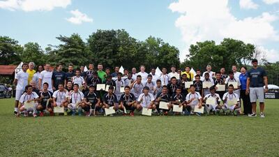 Celebrity players and coaches pose with the U19 teams during the Laureus All Stars Unity Cup on Tuesday. Ian Walton / Getty Images / March 25, 2014