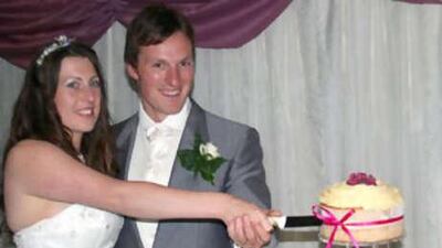 Ben and Catherine Mullany, who were murdered on their last day of their honeymoon in Antigua, cut the cake on their wedding day.