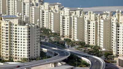 The Palm Jumeirah. The value of property deals in Dubai more than doubled in 2021 and broke a 12-year record in terms of real estate sales transactions. Jaime Puebla / The National