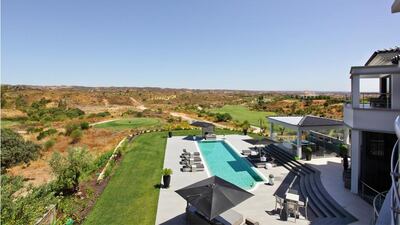 The villa overlooks holes six and seven. Courtesy Kensington Exclusive Properties