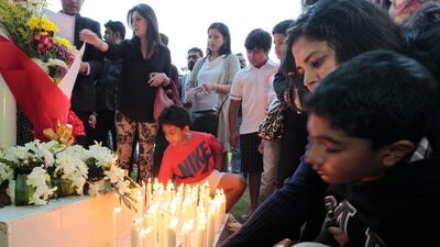 More than 1,000 people gathered for a candlelight vigil in Dubai to remember the 148 people killed, 132 of them children, in Tuesday’s attack by Taliban militants on a Pakistan army high school in Peshawar. Jeffrey E Biteng / The National