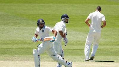 Rohit Sharma, left, should watch and learn from Virat Kohli, who has worked on his fitness over the years. Morne DeKlerk / Getty Images