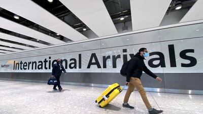 Travellers arrive at Heathrow Airport in London. Reuters