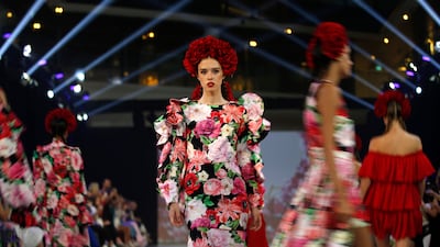 Flowers rule the runway at Dorota Goldpoint's presentation. EPA