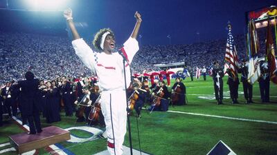 Houston sings the National Anthem during the pregame show at Super Bowl XXV in 1991. Getty Images