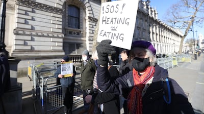 Members of the National Pensioners Convention demonstrate near Downing Street in London, against the rise in fuel and energy prices in the UK. PA