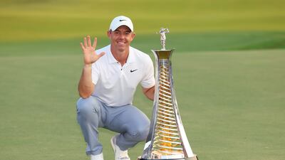 Rory McIlroy with the Race to Dubai trophy on the 18th green at the DP World Tour Championship on the Earth Course at Jumeirah Golf Estates on November 19, 2023. Getty Images