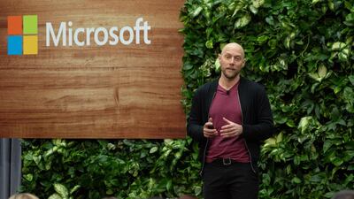 Lucas Joppa, chief environmental officer of Microsoft, speaks during a climate initiative event at the company's Redmond campus. Bloomberg