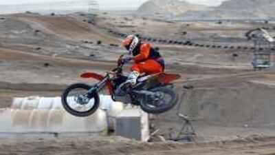 Sam Sunderland rides the circuit at the motocross park in Jebel Ali.