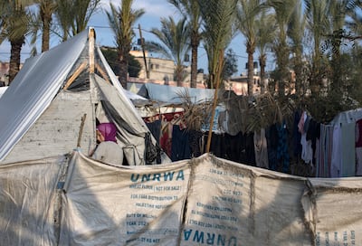 A displaced girl next to tents at a camp near Nasser Hospital in Khan Yunis, southern Gaza Strip, 02 January 2024. EPA