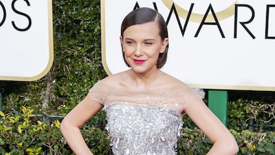 Millie Bobby Brown, wearing a silver sequined dress, arrives for the Golden Globe Awards in Beverly Hills on January 8, 2017. EPA