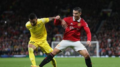 Sheriff's Renan Guedes and Manchester United's Cristiano Ronaldo battle for the ball. PA