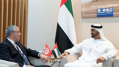 Sheikh Mohamed speaks with Abdul Karim Al Zubaidi, Tunisia's minister of defence. Rashed Al Mansoori / Ministry of Presidential Affairs