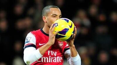 Theo Walcott is the latest off the Arsenal production line of wingers who have been successfully converted to goal-scoring strikers. Glyn Kirk / AFP