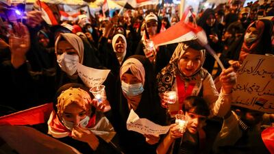 Iraqi women take part at an anti-government protest in the holy city of Najaf, Iraq. Reuters