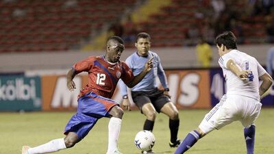 Joel Campbell and Costa Rica beat Paraguay 2-1. They'll play in Group D at the 2014 World Cup with Uruguay, England and Italy. Jeffrey Arguedas / EPA