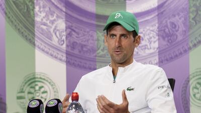 Novak Djokovic attends a press conference.