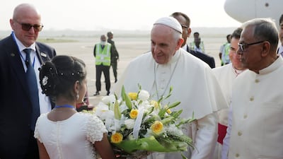 Pope Francis is welcomed after arriving in Bangladesh. Max Rossi / Reuters