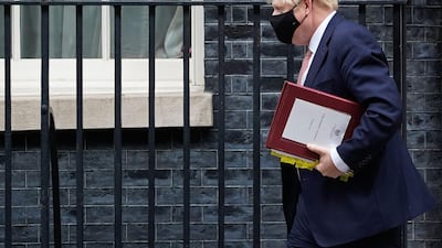 Prime Minister Boris Johnson leaves 10 Downing Street in central London. AFP