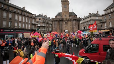 Protesters take part in a demonstration against a pensions reform in Vire, northwestern France, on April 1. AFP