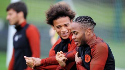 Raheem Sterling, right, is in direct competition for a place in the Manchester City team with new signing Leroy Sane. Peter Powell / EPA