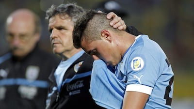 Jorge Gimenez and Uruguay will most likely occupy the CONMEBOL fifth-place spot after losing Friday night, setting up a play-off with Jordan. Martin Mejia / AP