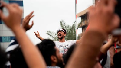 Iraqi students take part in an anti-government protest in the southern city of Basra. AFP