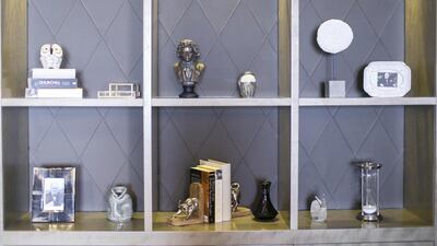 Books on Churchill on the shelves of St Regis’s Sir Winston Churchill suite. Reem Mohammed / The National