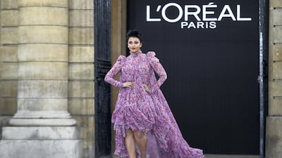 While this Giambattista Valli dress with fluffy heels won't be for everyone, there's no denying that Aishwarya Rai walking down the catwalk at Paris Fashion Week was a major fashion moment. AFP