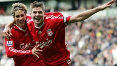 Liverpool's Steven Gerrard, right, celebrates his goal with Fernando Torres.