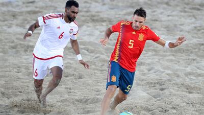 UAE's Kamal Ali and Spain's Francisco Jose Cintas during the 2019 Intercontinental Beach Soccer Cup. The two teams have been placed in Group A for the 2021 edition. Chris Whiteoak / The National
