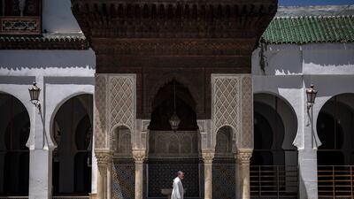 Although off-limits to tourists, some take advantage of the doors being opened shortly before prayers to snap photos in the courtyard.