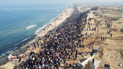 Displaced Palestinians make their way back to their homes in northern Gaza, amid a ceasefire between Israel and Hamas, in the central Gaza Strip. EPA