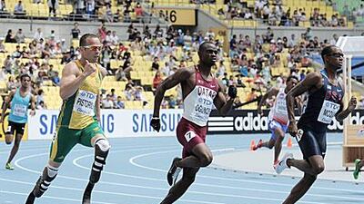 Oscar Pistorius, the South African sprinter known as "Blade Runner", finsihed third in his heat to reach the semi-finals of the 400m at the World Championships in Daegu.
