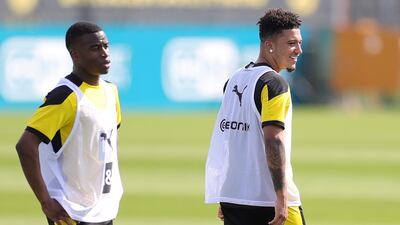Jadon Sancho and Youssoufa Moukoko attend a training session with Borussia Dortmund at the team training grounds in Dortmund. EPA