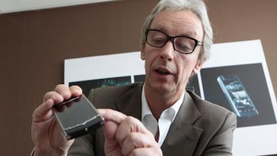 Perry Oosting, the president of Vertu, demonstrates the Vertu Ti in Dubai. Jeffrey E Biteng / The National