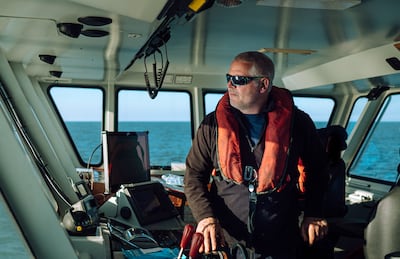 Wave Crookes of SeaGrown at the deck of his vessel. Photo: SeaGrown